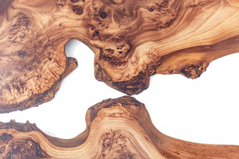 Detailed close-up of live edge wood grain showcasing natural textures and curves.